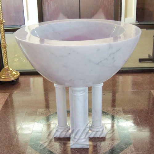 Religious Statues of White Marble Holy water Font in a Church on Stock